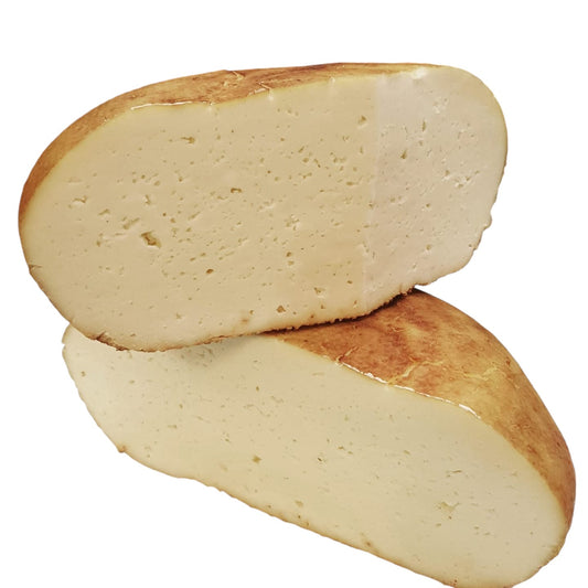 Formaggio Pecorino - pan di Formaggio , formaggio dal sapore dolce affumicato con una leggera occhiatura,